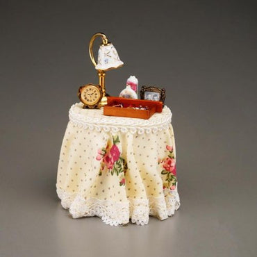 Round bedside table with deco