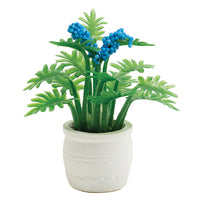 Potteplante m/ blå blomst