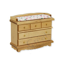 Changing table, pink mattress included