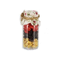 Glass with pickled fruits