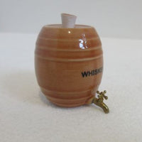 Ceramic whiskey container