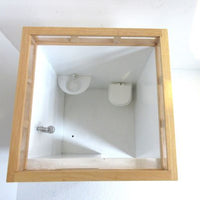 Independent bathroom building with sliding door