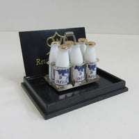 6 fl. milk in holder