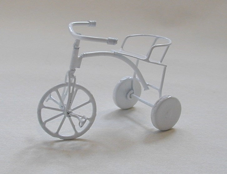 Trehjulet cykel , hvid metal