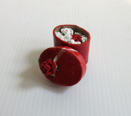 Gave-blomst lille rød oval