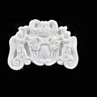 Coat of arms, plaster H: 3.2 cm W: 4.5 cm