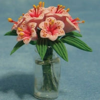 Glass vase w/ lilies pink